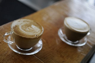 Holding regular Office Hours over coffee will solve your meeting problem.
