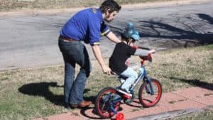 Like training wheels on a bike, make yourself needed but not necessary
